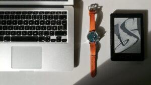 silver and blue analog watch